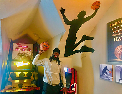 DeMarre Carroll playing basketball at The Lake Louisa Chateau near Orlando Florida - the ultimate sports-themed vacation home rental