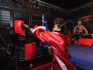 punching the NexerSys boxing machine at Lake Louisa Chateau