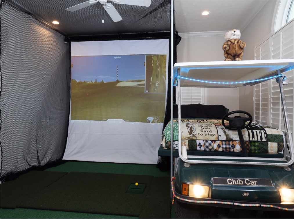 golden tee machine and golf themed bedroom